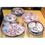 A group of nine 19th century Japanese Imari lobed dishes, bowls and plates (most a.f)