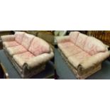 Pair of pink upholstered sofas