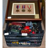 A group of assorted collectables including a framed group of medals, Hornby locomotives etc