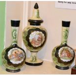 A set of three Victorian painted glass vases decorated with vignettes of courting couples