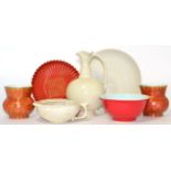 A group of Oriental items including a cream crackle glaze cup; an iron red dish on pedestal