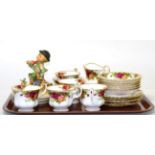 A group including Royal Albert Old Country Roses, Royal Worcester plate, Goebel figures etc