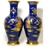 A pair of Carlton ware blue ground vases in the pagoda pattern Height 48cm. each with minor paint