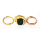 A gents 9ct gold signet ring together with two 9ct gold band rings Signet ring - finger size O1/2,