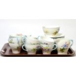 A hand painted floral design Shelly part tea service