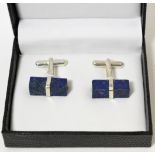 A cased pair of lapis lazuli cufflinks mounted in white metal stamped '925'11.59g gross