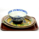 A Chinese blue and white bowl, bearing Kangxi marks, dragon design; together with a pair of