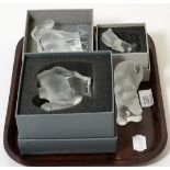 Four Lalique glass models comprising a camel (boxed), two elephants (one boxed) and a circus