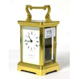 A brass carriage timepiece retailed by Garrard & Co, London W1