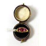 A Victorian three stone ruby ring Finger size G1/2, 5.58g gross