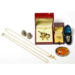 A group of jewellery including a pearl set ring, cross pendant, amber brooch, Continental silver