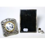 A Victorian silver mounted dressing table clock, silver frame, miniature silver tankard and