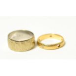 A 9ct gold band ring and a diamond eternity ring (one diamond deficient)Band ring - finger size P1/