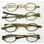 Four pairs of silver framed spectacles