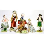 A group of Continental porcelain figures; a group of deer; and a ballerina box and cover