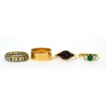 A Continental yellow metal band ring, a 9ct gold sapphire and diamond eternity ring, an emerald