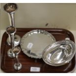 A silver waiter, bowl and three bud vases