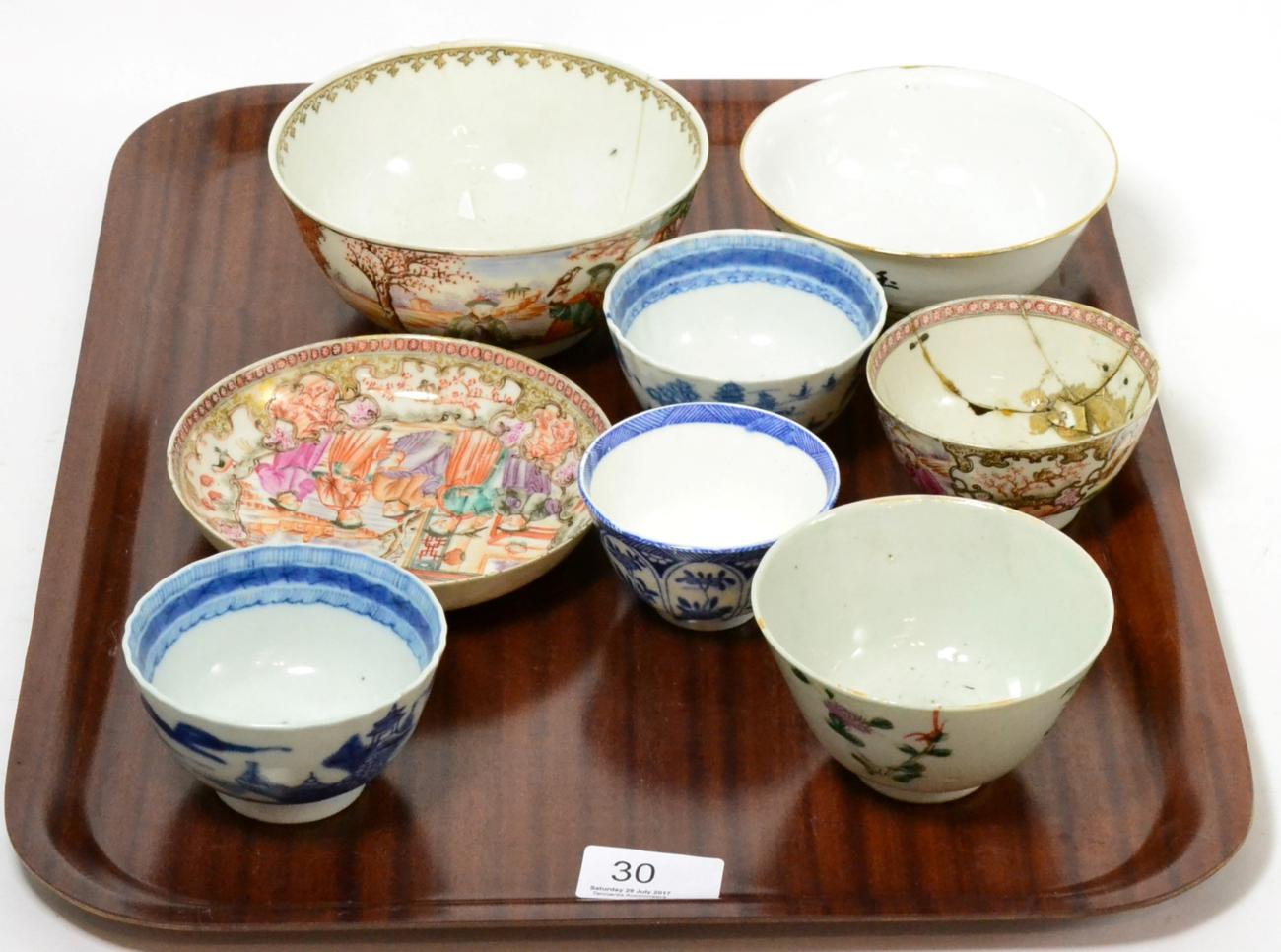 A group of Chinese porcelain tea bowls, a saucer and a bowl (a.f.)Teabowl one - chips to the rim and