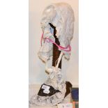 Wig stand with lace bonnets