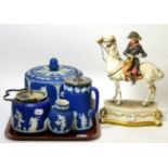 A Wedgwood style blue jasper cheese dome; a Wedgwood hot water jug and two Adams examples; and a
