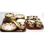 Royal Crown Derby Imari wares comprising twelve teacups, twelve saucers and side plates, cream and
