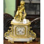 An alabaster and gilt bronze striking mantel clock, surmounted by a Cherub