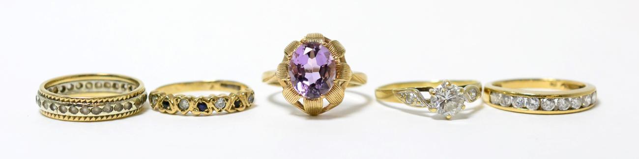 A 9ct gold amethyst ring, finger size M1/2 and four other 9ct gold gem set rings (5)Gross weight