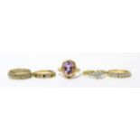 A 9ct gold amethyst ring, finger size M1/2 and four other 9ct gold gem set rings (5)Gross weight