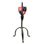 Brush stand, and heraldic metal badge