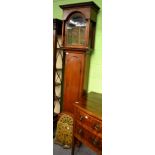 An oak longcase clock, late 18th century, with a later arched dial, with battery driven movement