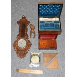 A carved oak barometer, rules, tea caddy, Victorian box etc