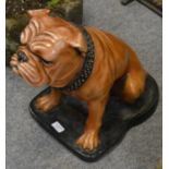 A large painted composition model of a bulldog
