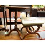 A needlework stool on a carved mahogany frame together with a tilt top occasional table