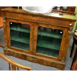 A 19th century inlaid walnut glazed bookcase