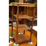 A Regency mahogany occasional table with three shelf stretchers