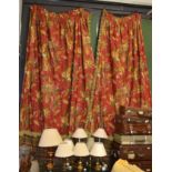 A pair of good quality, double lined curtains with fringe trim, decorated with fishing motifs;