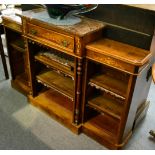 A Victorian figured walnut bookcase