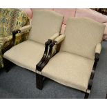 A pair of Gainsborough style open armchairs