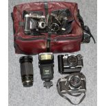 Various cameras including Olympus OMIO, one Ikonta folding, two others and two lenses