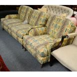 A feather filled two piece suite comprising a sofa and an armchair