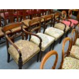 A set of four Regency mahogany dining chairs including two carvers together with a pair of Victorian