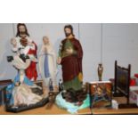 A quantity of religious items including plaster casts of Jesus, The Virgin Mary etc; crucifixes,