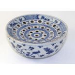 An English Delft Colander Bowl, circa 1760, of circular form, the pierced interior with bands of