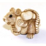 A Japanese Ivory Netsuke, Meiji period, as a rat carrying a gourd on its back, signed, 2.5cm long