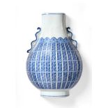 A Chinese Porcelain Wall Pocket, of baluster vase form, painted in underglaze blue with rows of