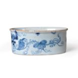 An English Delft Potted Meat Pot, circa 1760, of oval form, painted in blue with a squirrel and