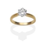 An 18 Carat Gold Diamond Solitaire Ring, a round brilliant cut diamond in a white claw setting to