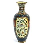 A Japanese Cloisonné Baluster Vase, Meiji period, with flared trumpet neck, decorated with panels of