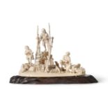 A Japanese Ivory Figure Group, Meiji period, of a farmer working a waterwheel, another holding a