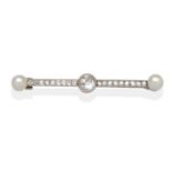 A Diamond and Pearl Bar Brooch, a central old cut diamond in a white milgrain setting to an eight-